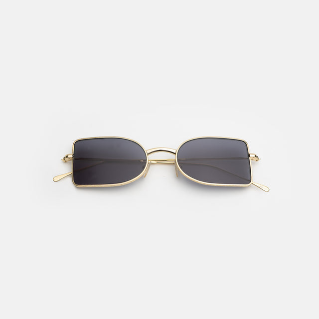 Nostrand Sunglasses side view in Gold / Grey