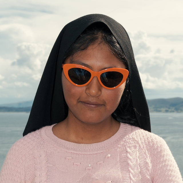 Young Peruvian woman wearing Pamela Sunglasses in Aperol