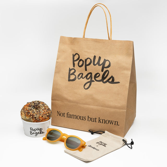 Bag of bagels PopUp Bagels x illesteva and limited edition cloth PopUp Bagels x illesteva Sunglasses side view in Matte Honey Gold / Olive