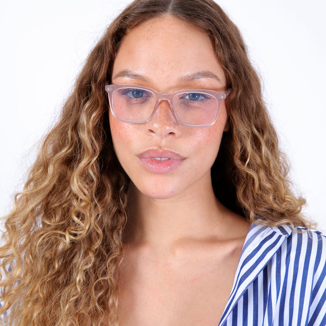 Model with curly, ombre hair wearing Portland Optical Thistle Optical