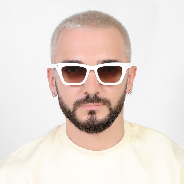 Model with platinum buzzcut wearing Portugal Sunglasses White with Brown Flat Gradient