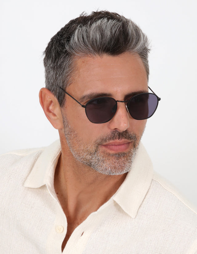 Model wearing Prince Sunglasses in Matte Black