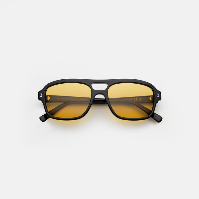 Queens Sunglasses side view in Black / Honey Flat See Through