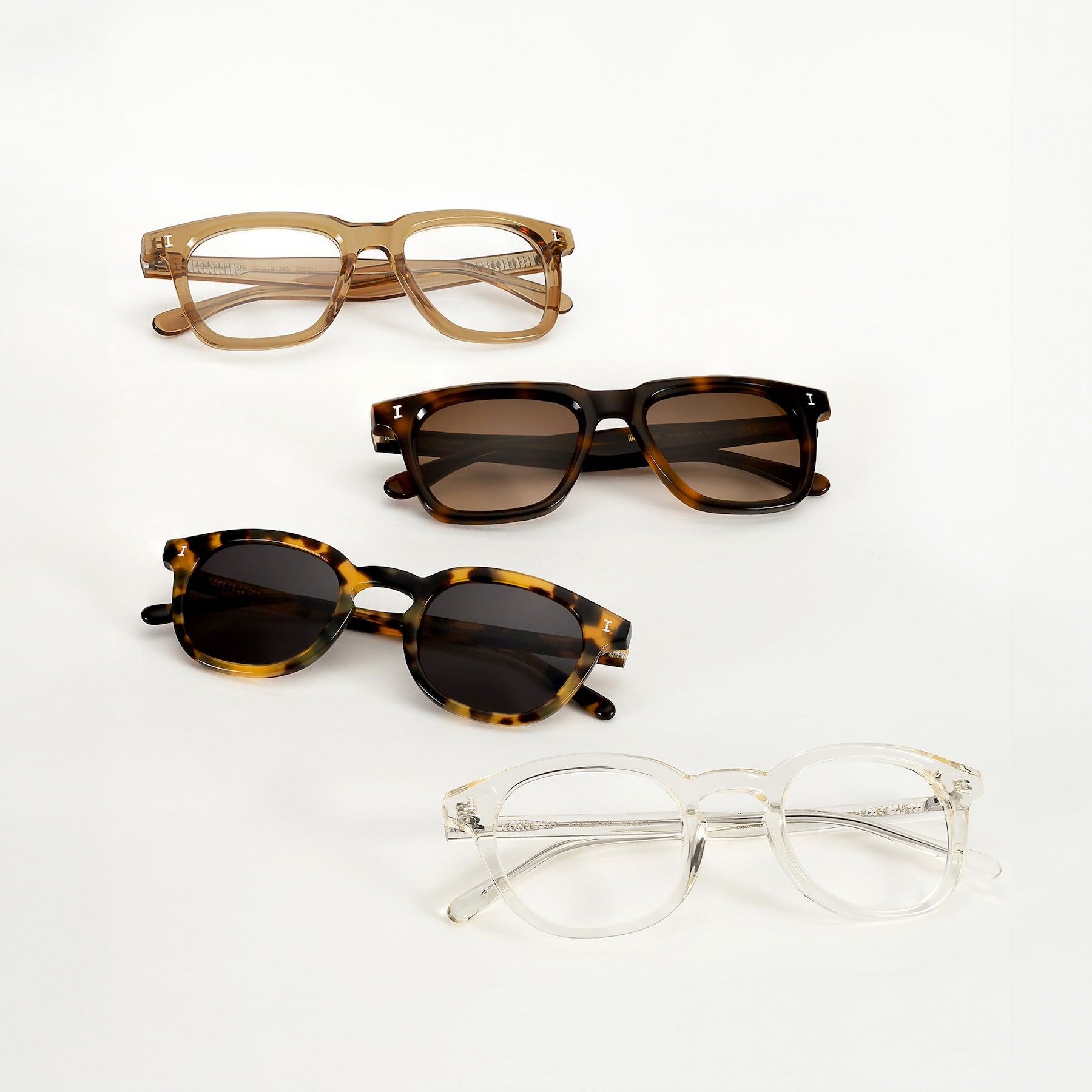 Toscana Optical in Brown, Toscana Sunglasses in Havana, Slope Sunglasses in Tortoise, and Slope Optical in Champagne featured on a white background