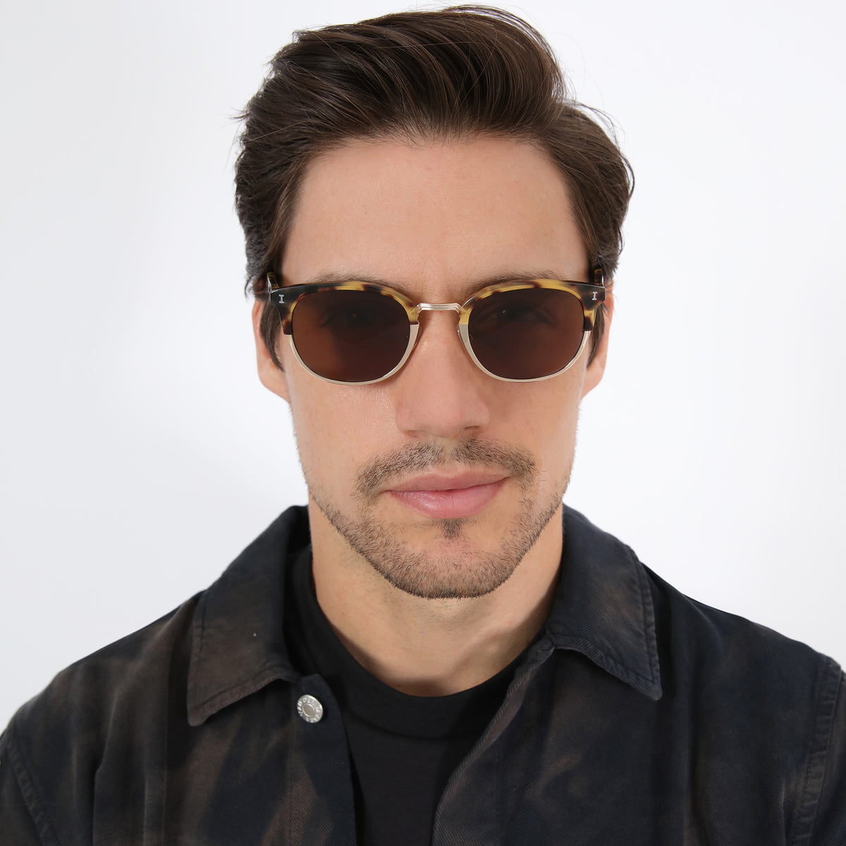 Man wearing Stockholm Sunglasses in Tortoise with Gold lenses