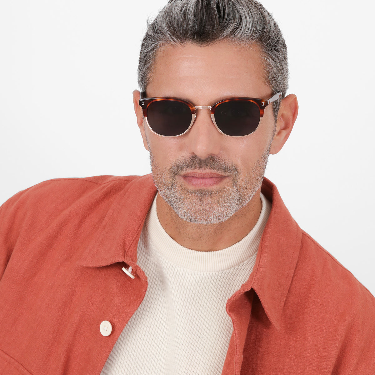 Man wearing Stockholm Sunglasses in Havana with Rose Gold lenses, Model with salt and pepper hair and beard