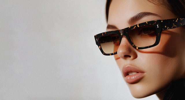 Woman wearing Trancoso Sunglasses in Flame with Brown Gradient lenses