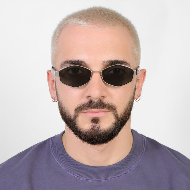 Model with a platinum buzzcut wearing Tucson Sunglasses Silver/Winter with Grey