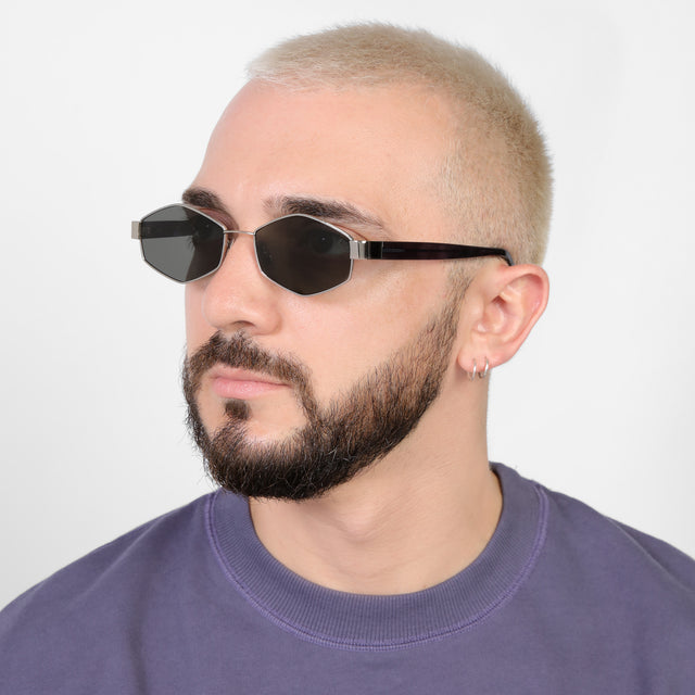 Bearded model looking right wearing Tucson Sunglasses Silver/Winter with Grey