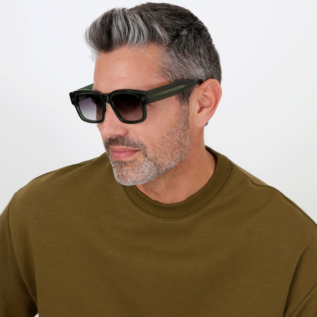 Model with salt and pepper hair and beard wearing Vito Sunglasses Pine with Grey Gradient