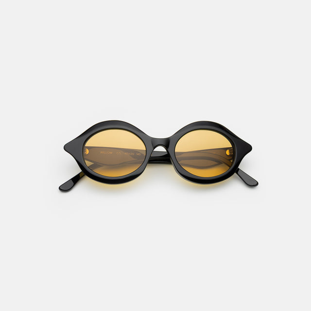 Willow Sunglasses side view in Black / Honey See Through