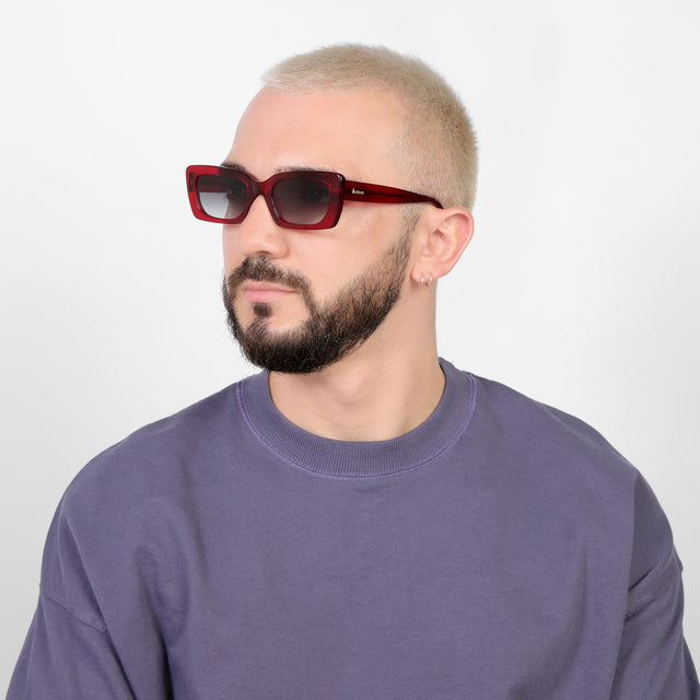 Bearded model looking right wearing Wilson Sunglasses Mulberry with Grey Flat Gradient 