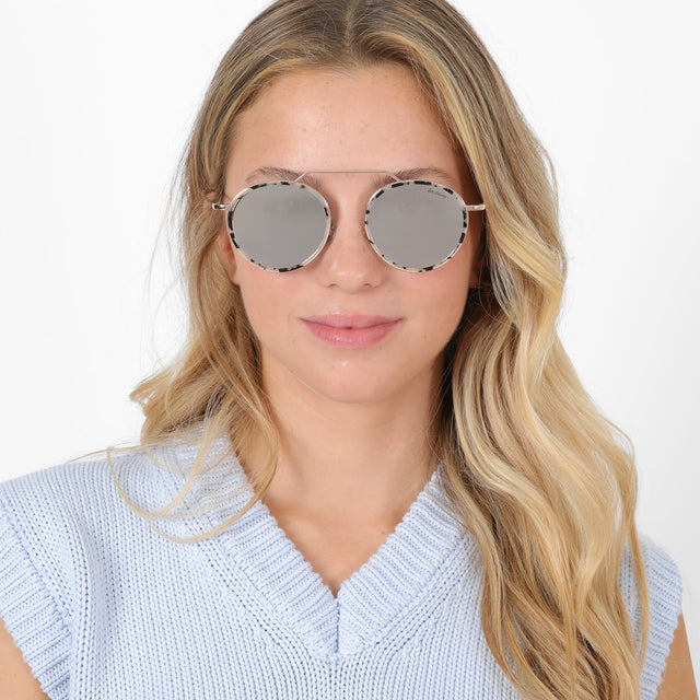 Blonde model wearing Wynwood Ace Sunglasses White Tortoise/Gold with Silver Flat Mirror