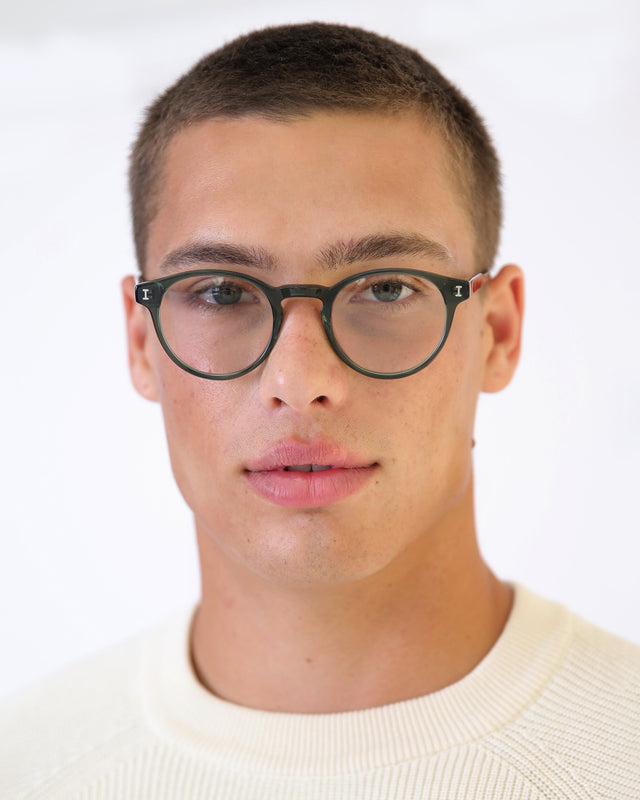 Model with buzzcut wearing Wyoming Optical Pine Optical