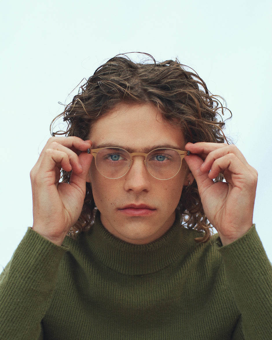 male model wearing Tompkins Titanium Optical glasses
