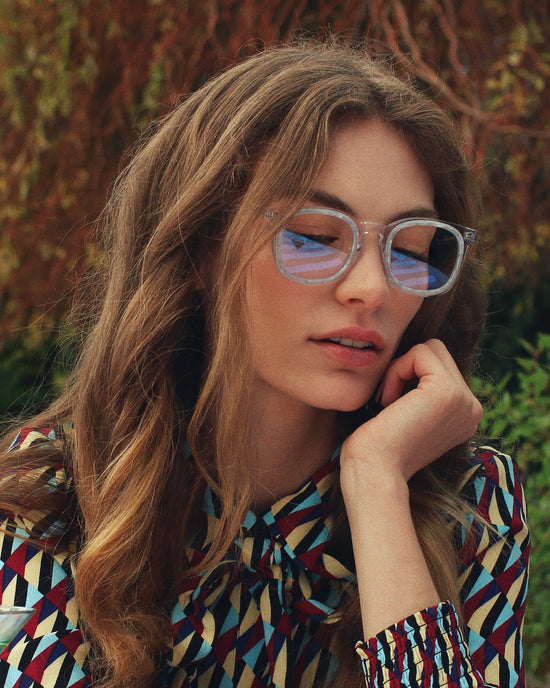 female model wearing 75003 Ace Optical glasses