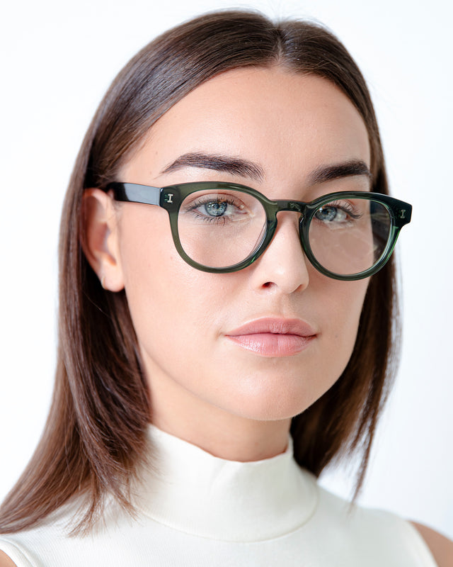 Brunette model with straight hair color: Pine Optical