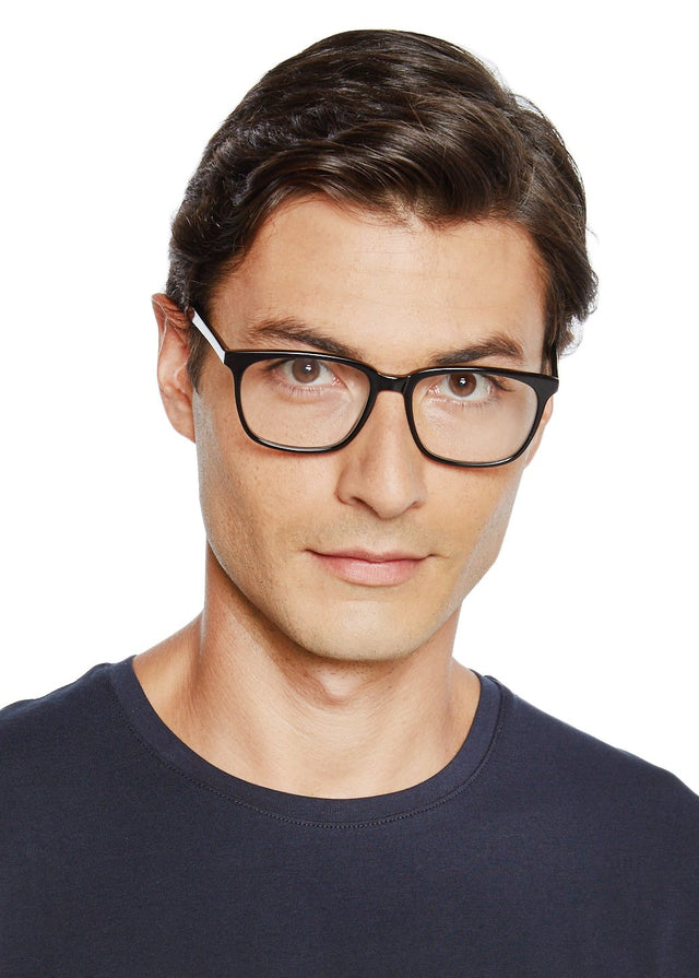  Model with short brown hair wearing Axel Optical Black Optical