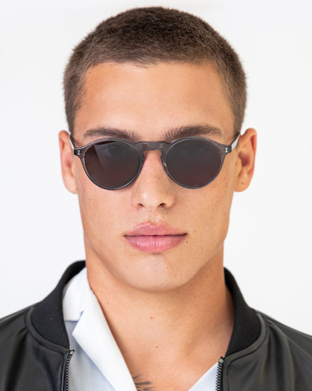 Model with buzzcut wearing Capri Sunglasses Mercury with Grey