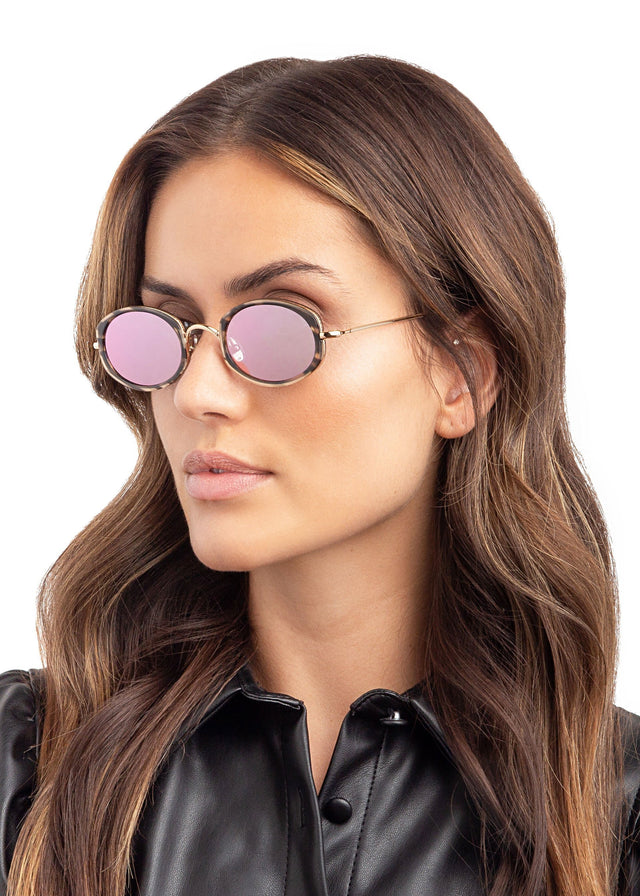 wearing Ravello II Sunglasses Clear Charcoal/Gold w/ Bright Rose Mirror