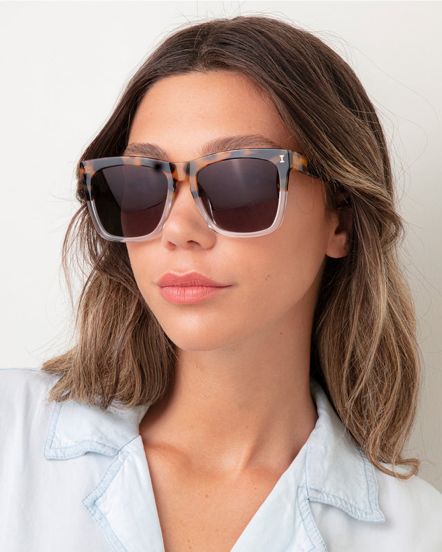 Brunette model with ombre wavy hair wearing Los Feliz Sunglasses Half Half Tortoise with Grey