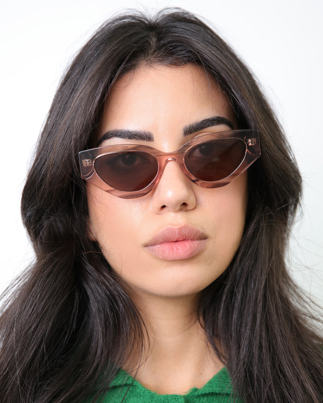 Brunette Woman wearing Mary Lou 51 Sunglasses Dusty Peach with Brown Flat
