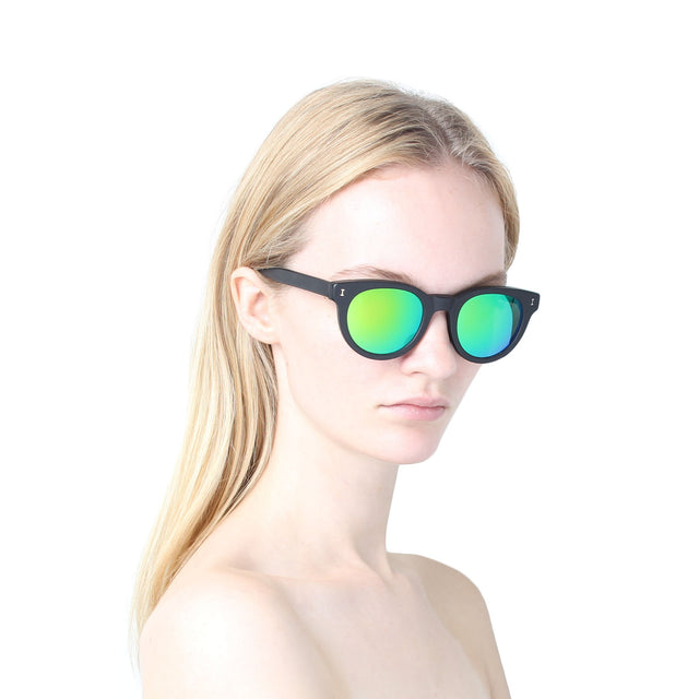 wearing Greenport Sunglasses Matte Black with Green Mirror